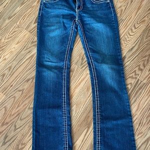 Miss Chic Jeans studded with rhinestone embellishments.